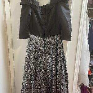 Elegant Black and Silver Off-Shoulder Dress with train